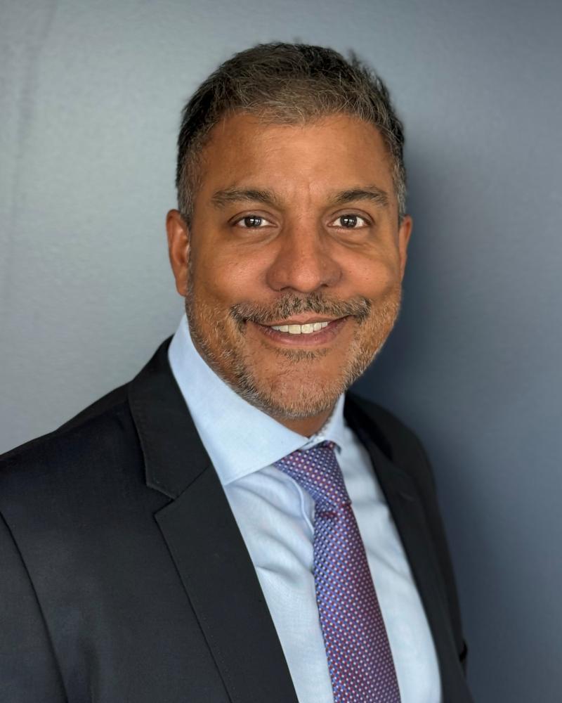 Dr. Ravi Dookeran